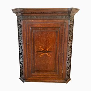 Mueble esquinero antiguo de roble con incrustaciones