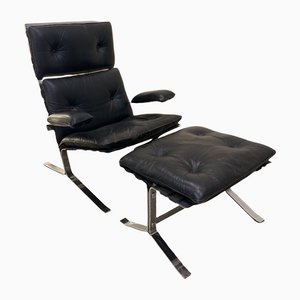 Lounge Chair & Footstool in Leather by Olivier Mourgue for Airborne, 1960s, Set of 2