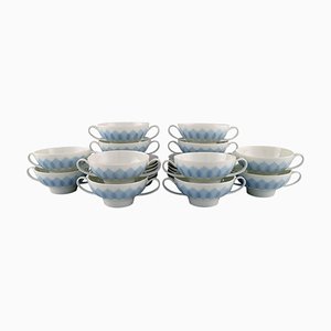 Lotus Porcelain Bouillon Cups with Saucers by Bjørn Wiinblad for Rosenthal, Set of 24