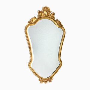 Specchio con cornice ornamentale