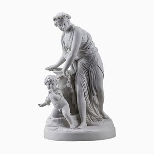 Bisque Porcelain Cupid Disarmed by a Vestal