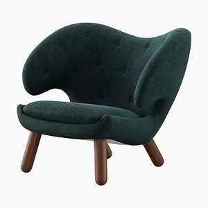 Pelican Chair in Wood and Fabric by Finn Juhl