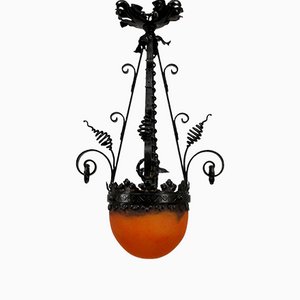 Lampada Art Nouveau in vetro e forgiatura