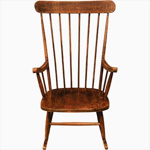 20th Century Rustic Elm Spindle Back Rocking Chair