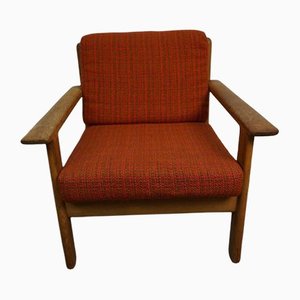 Mid-Century Red & Oak Antimott Armchair by Walther Knoll