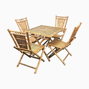 Mesa plegable italiana Mid-Century de bambú y ratán con cuatro sillas, años 60. Juego de 5