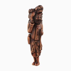 Viajero de madera de Netsuke