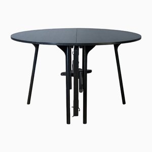 Tavolo rotondo PH pieghevole, gambe in legno di quercia nero, piatto e bordo impiallacciati