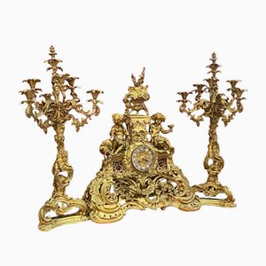 19th Century French Gilt Bronze Candelabras and Clock Garniture