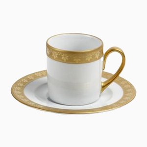 Taza de café blanca y dorada con platillo de Stella Fatucchi Art Porcelain. Juego de 2