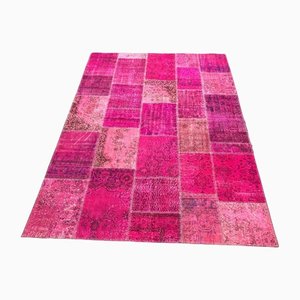 Alfombra sobreteñida en rosa