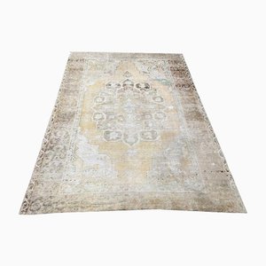 Verblassener Vintage Teppich