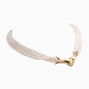Collana di perle con chiusura in oro a 18 carati e diamanti