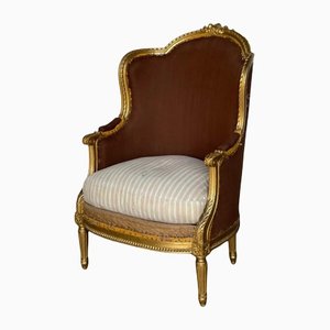 Großer französischer Bergere Stuhl aus vergoldetem Metall, 19. Jh