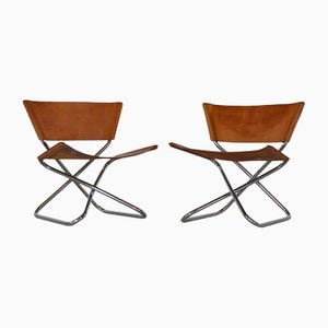Danish Modern Lounge Chairs in Saddle Leather and Steel by Erik Magnussen for Torben Ørskov, Set of 2
