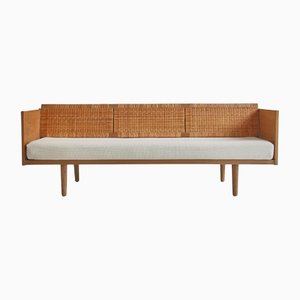 Sofá cama GE7 danés moderno de roble y ratán de Hans J. Wegner para Getama, años 50