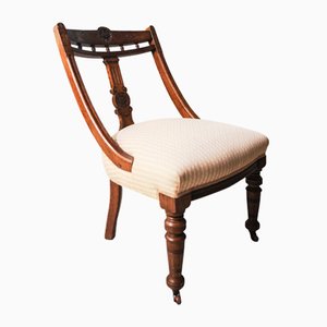 19th Century Oak Upholstered Salon Chair with Carved Rail Back & Central Rear on Front Castors, 1800s