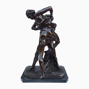 Escultura de bronce con Hércules y Anteo con base de mármol, siglo XX