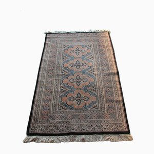 Small Oriental Fringed Rug