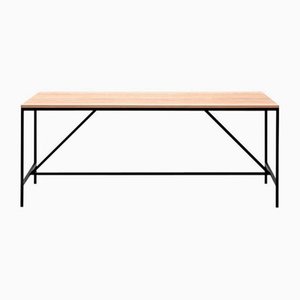 Cache Dining Table in Wood and Steel by Paul McCobb