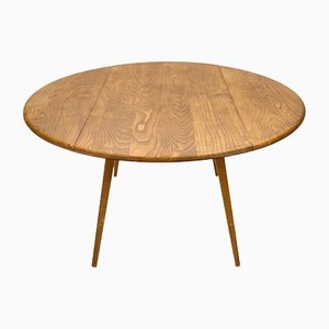 English Blonde Drop Leaf Circular Dining Table by Lucian Ercolani for Ercol, 1960s