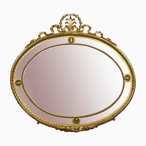 Espejo de pared ovalado dorado