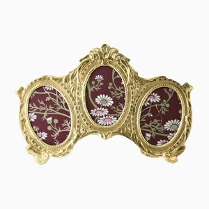 Polished Brass Lovers Knot Triple Picture Frame from J.H. France, 1900s