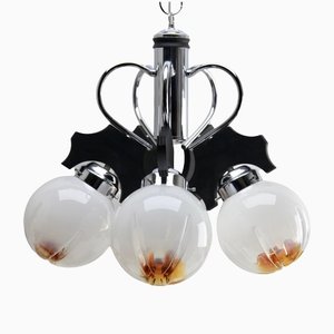Lámpara colgante con 5 esferas de vidrio transparente con inclusiones naranjas de Mazzega