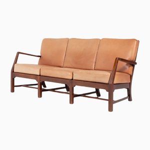 Divano Mid-Century a tre posti moderno con cuscini in pelle color cognac, Danimarca