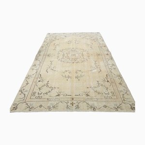 Orientalischer Vintage Wollteppich in Beige