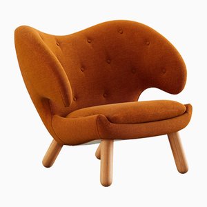 Pelican Chair in Wood and Fabric by Finn Juhl