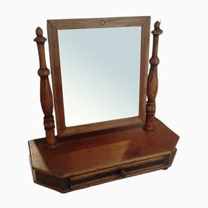 Kleiner Spiegel mit Rahmen aus Nussholz