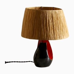 Lámpara de mesa francesa de cerámica negra y roja, años 50