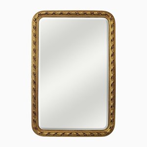 Specchio con cornice in legno intagliato a mano