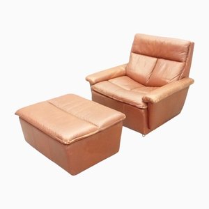 Sillón y reposapiés Mid-Century de cuero, años 70. Juego de 2