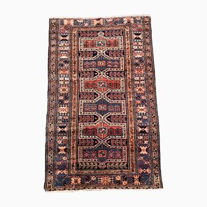 Mittelgroßer orientalischer roter dunkelblauer Vintage Karacah Teppich