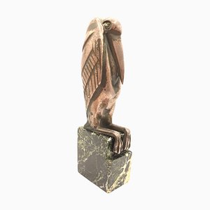 Pelikan, Mitte 20. Jh., Bronzeskulptur auf grünem Marmorsockel