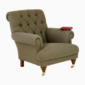 Sillón con respaldo abotonado