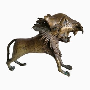 León de bronce africano