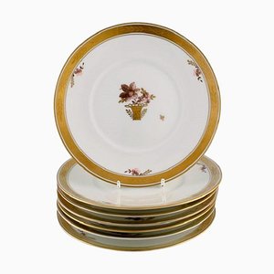 Platos para el almuerzo con cesta dorada de porcelana de Royal Copenhagen. Juego de 7