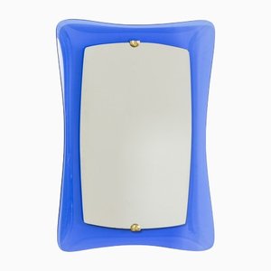 Espejo de pared con marco de vidrio coloreado en azul y detalles de latón de Cristal Art, años 50