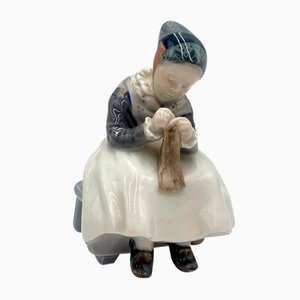 Porcelain Figurine of a Sewing Woman from Royal Copenhagen, Denmark