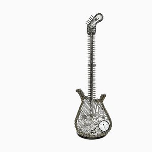 Guitarra decorativa de metal hecha a mano