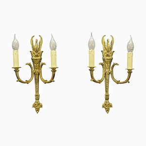 Apliques franceses estilo Imperio de bronce dorado con dos luces, principios del siglo XX. Juego de 2