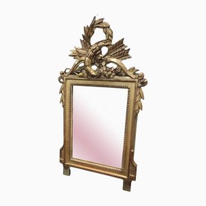 Espejo estilo Luis XVI pequeño de madera dorada