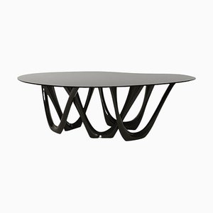 Consola G-Table escultural de acero negro brillante de Zieta