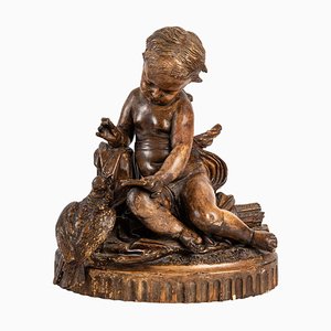 Figurina di bambino in terracotta