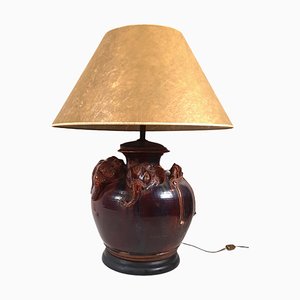 Lámpara de mesa en forma de elefante marrón
