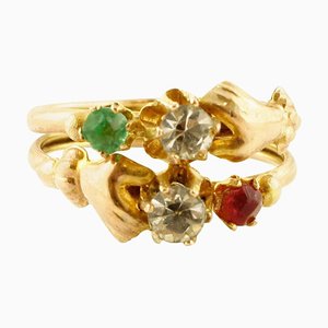 Anillo de oro rosa de 9 quilates con piedras rojas, verdes y blancas