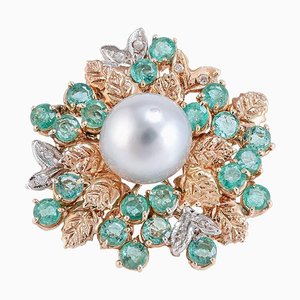 Anello con diamanti, smeraldo, bianco perla e oro rosa